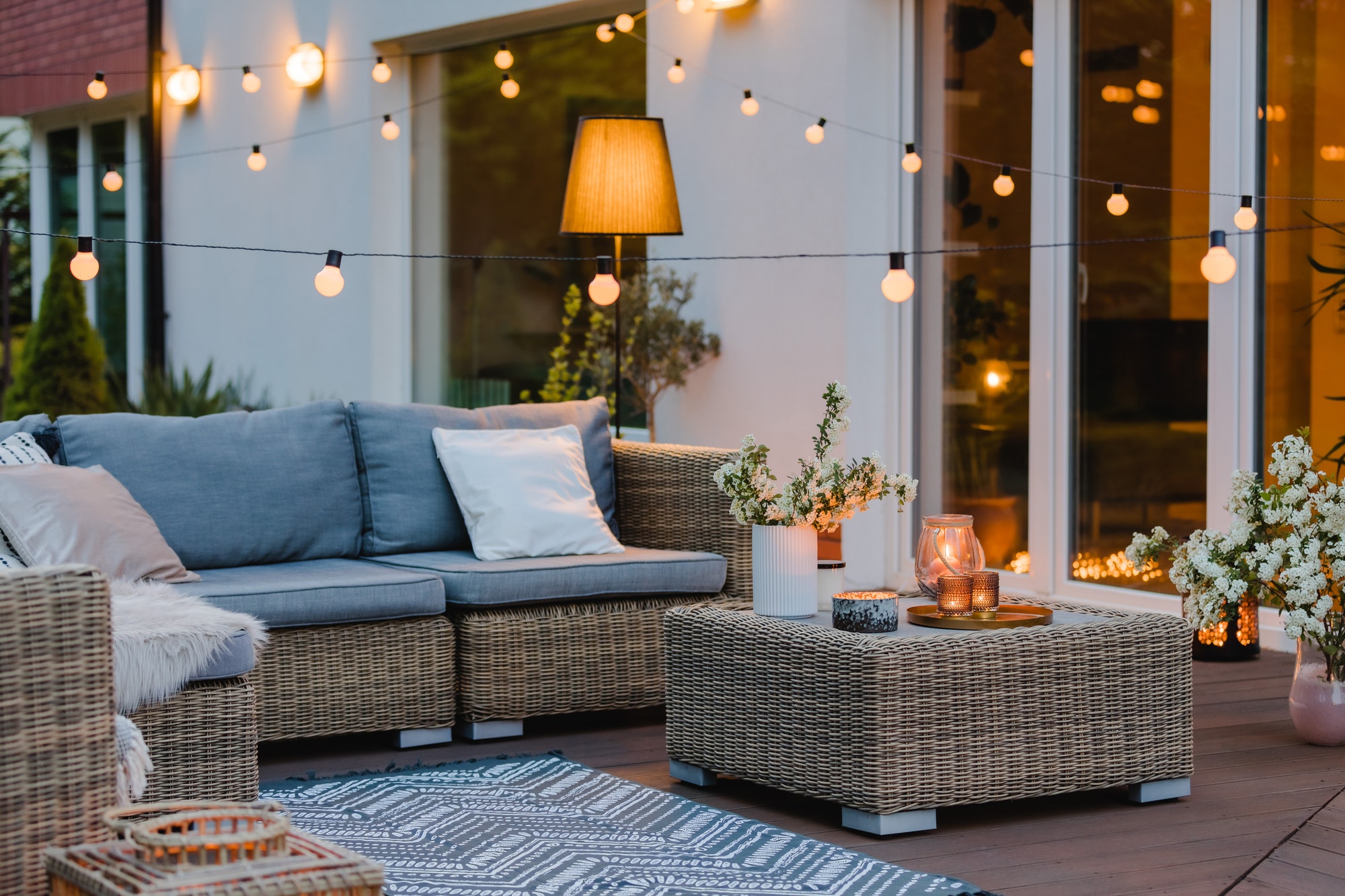 summer-with-patio-with-wicker-furniture-and-lights.jpg